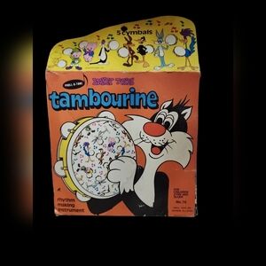 Vintage Looney Tunes Tambourine with Characters.  Comes In Original Box.